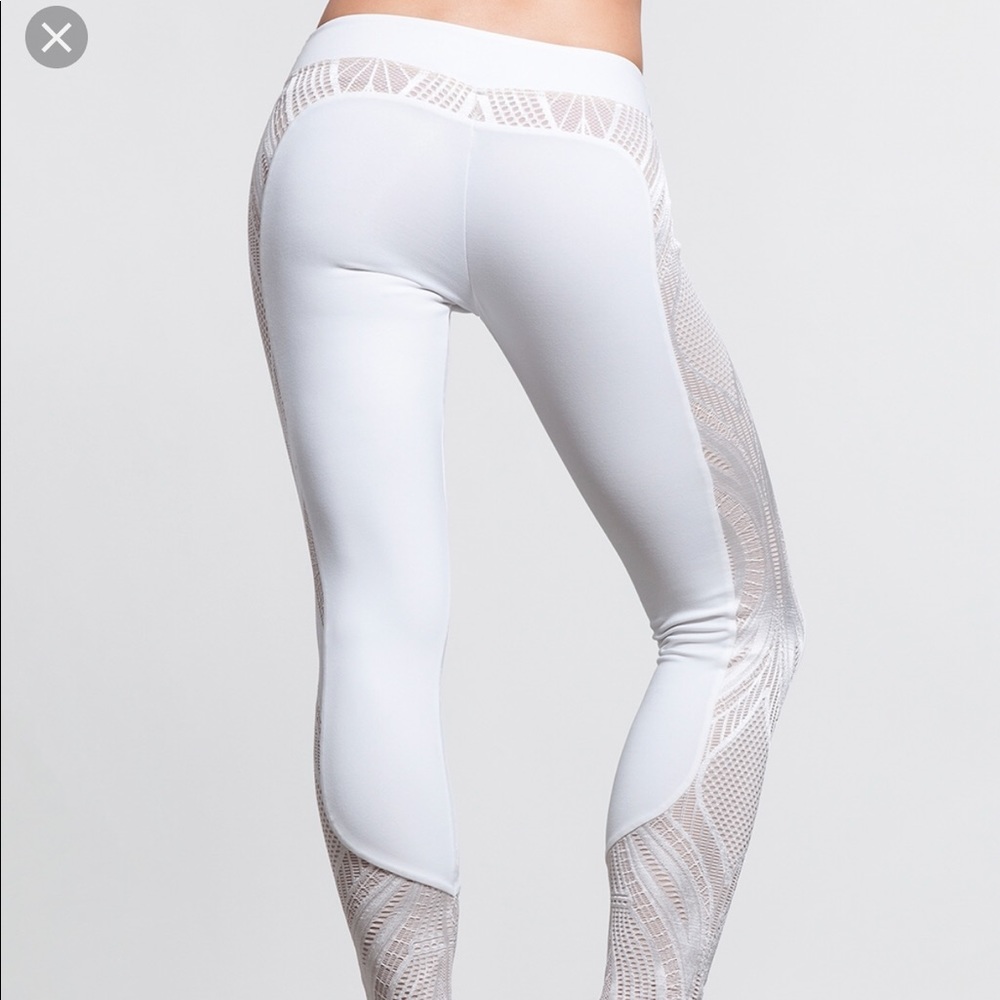 White athletic leggings with lace detail